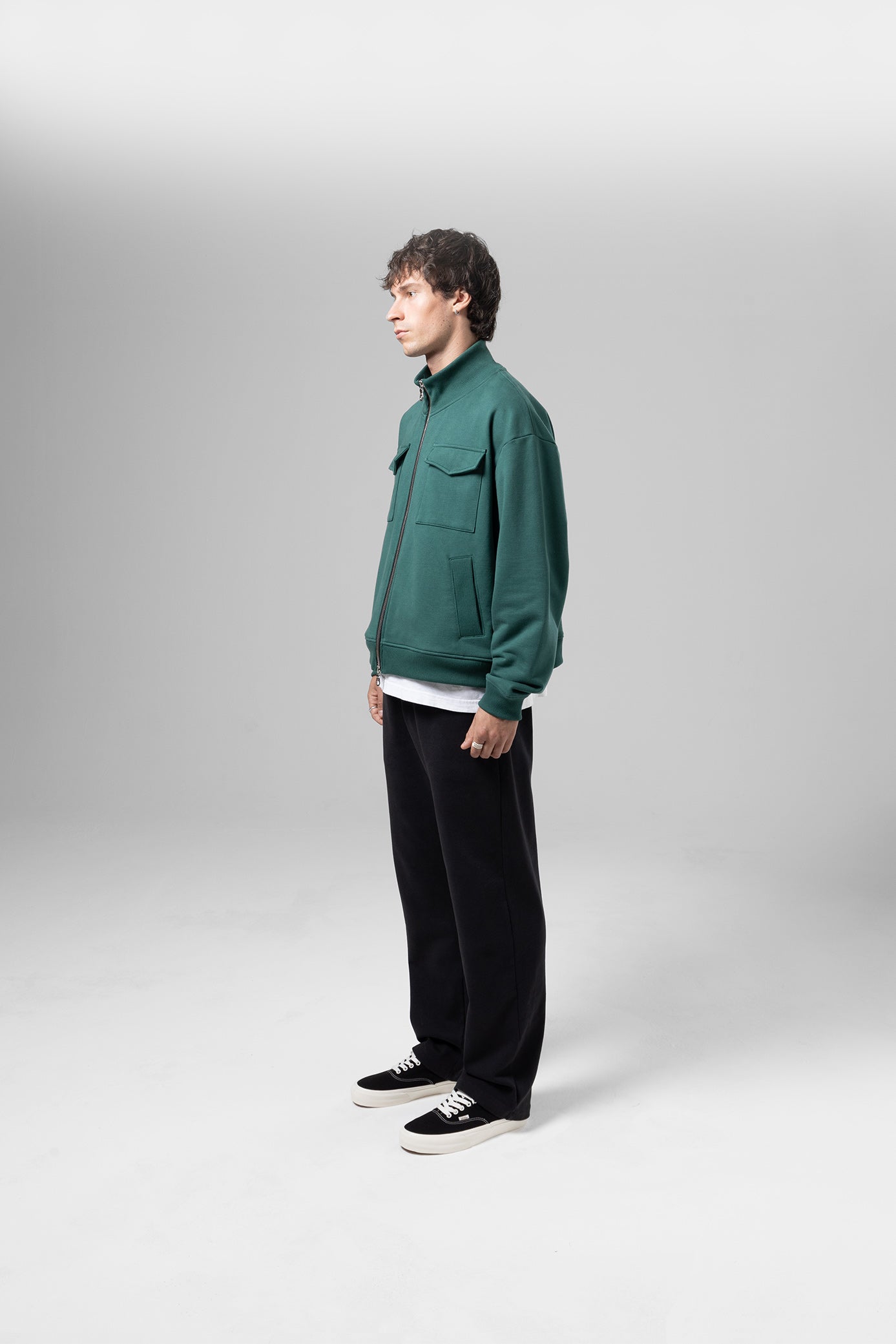 Angled view of Forest Green - Track Jacket